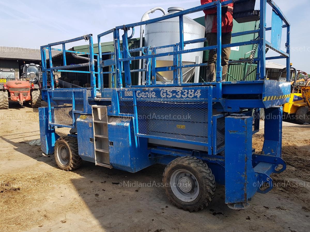 2004 GENIE GS-3384 ROUGH TERRAIN SCISSOR LIFT AUTO LEVELLING 4WD. STARTS, DRIVES AND LIFTS
