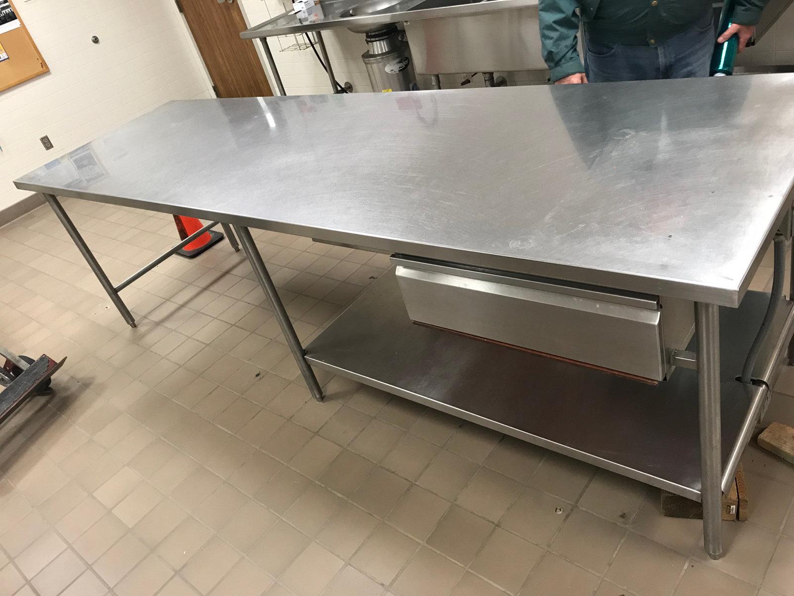 Approx 10 foot by 30 inch stainless steel table