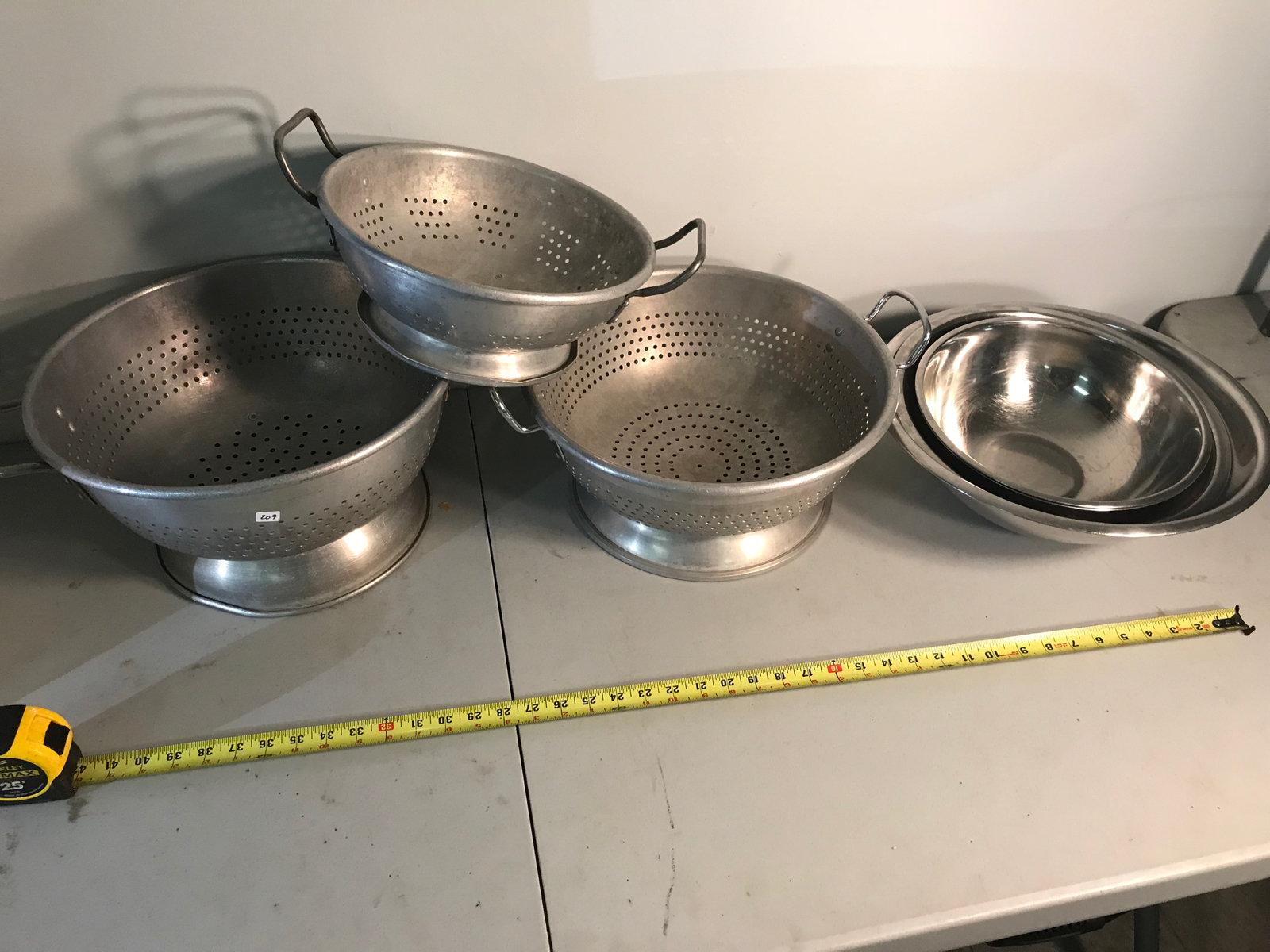 Stainless mixing bowls and aluminum colanders