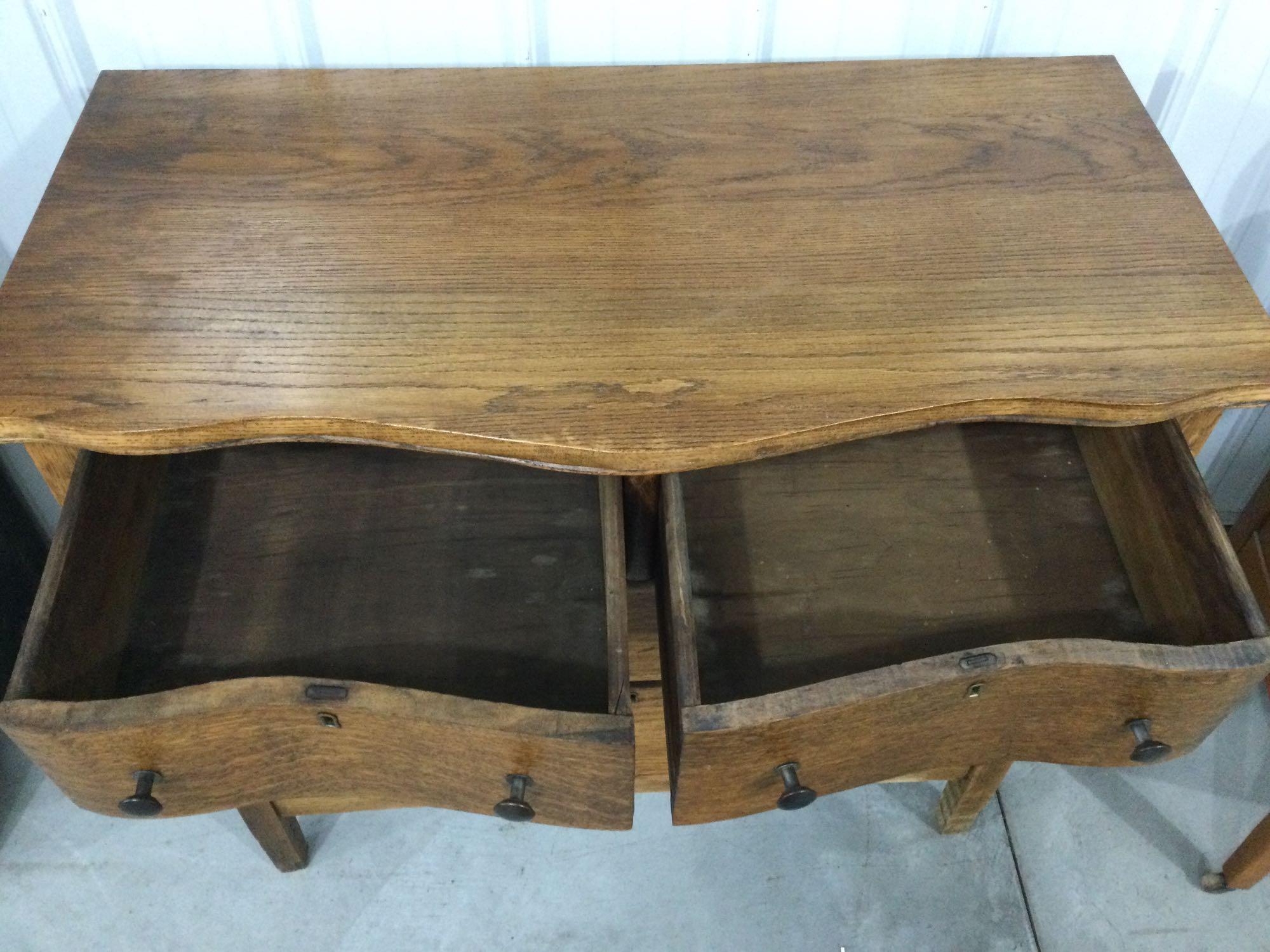 Antique curved drawer dresser