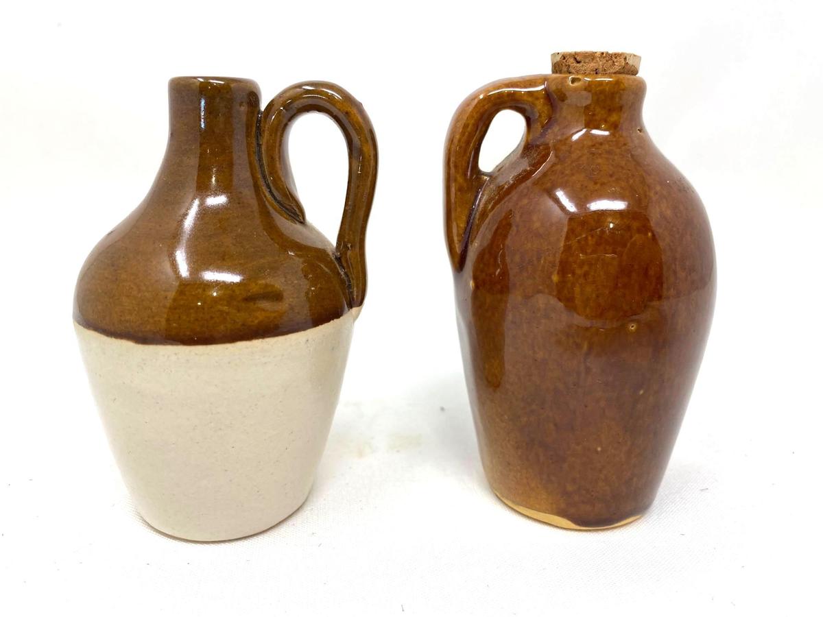 Two small crock jugs