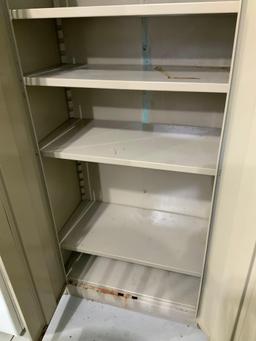 Tan metal cabinet w/ shelves