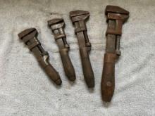 (4) antique adjustable wrenches