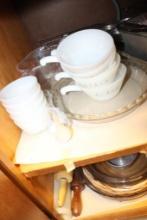 Contents of Kitchen cabinets to include mixing bowls, dishes, etc.