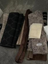 LARGE QUANTITY OF RUGS