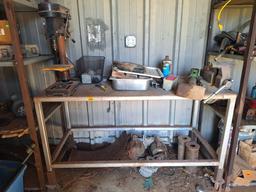 work table with vise and other items