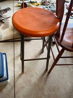 stool, wooden chair, and metal chair
