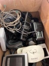 box of electronics and bug zapper