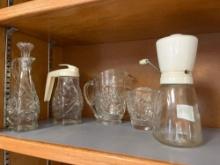 small glass pitchers, syrup bottle, oil bottle