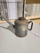Old metal quart oil can with handle and spout. Used.