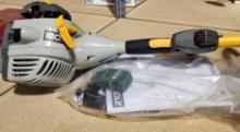 RYOBI gas powered weed eater with 4 changeable heads. Two straight and two curved. Used.