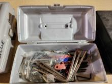 Plano tackle box with assorted allen wrenches.