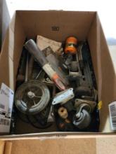 Miscellaneous items. Caster wheels, power tool battery charger, etc. Used.