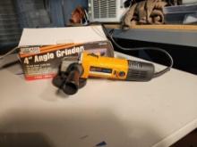 Chicago power electric 4" angle grinder. Used, in nice condition. Works.