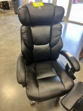 BLACK ROLLING RECLINING OFFICE CHAIR
