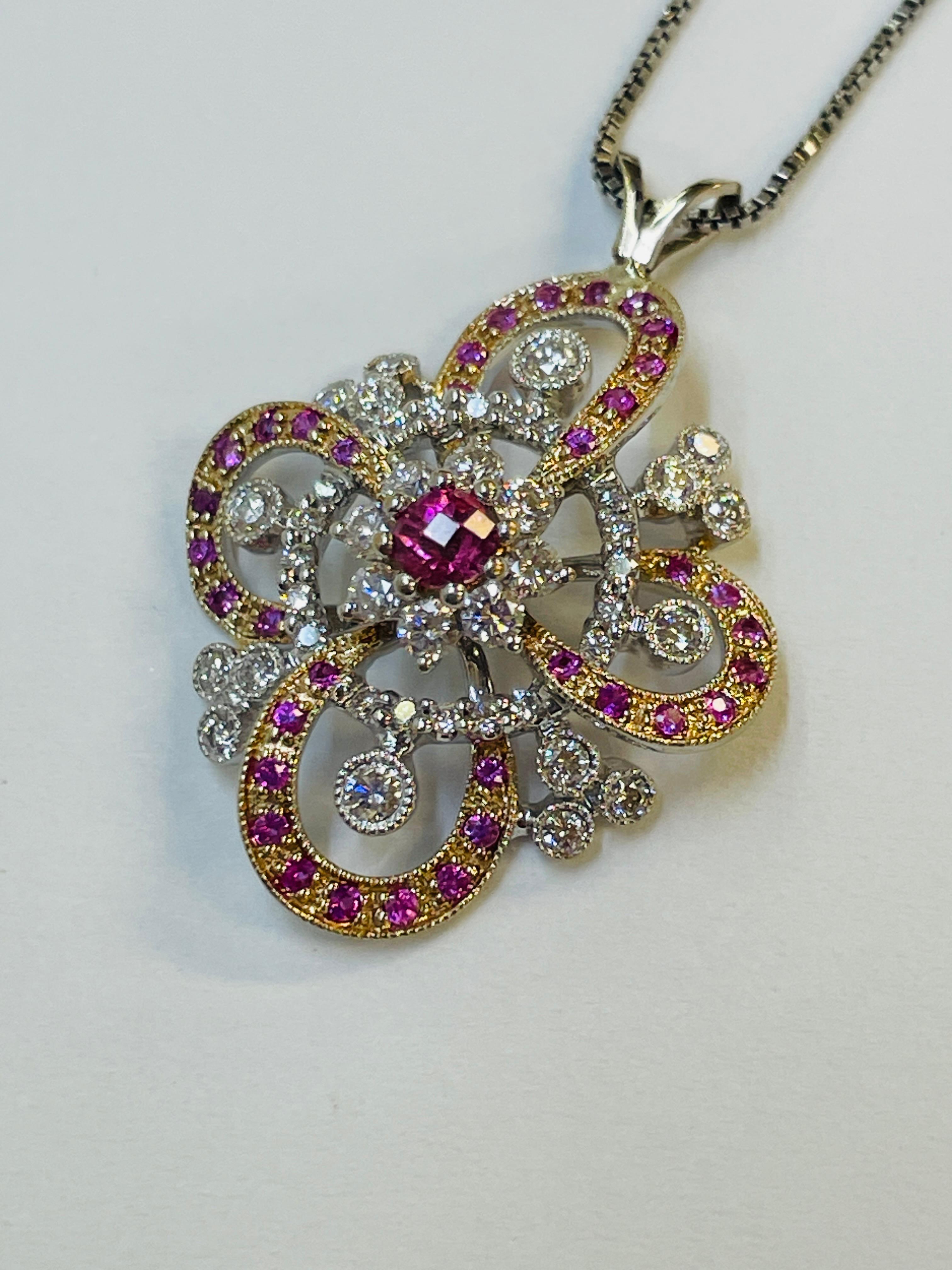 14KT WHITE AND YELLOW GOLD PINK SAPPHIRE AND DIAMOND PENDANT WITH APPRAISAL