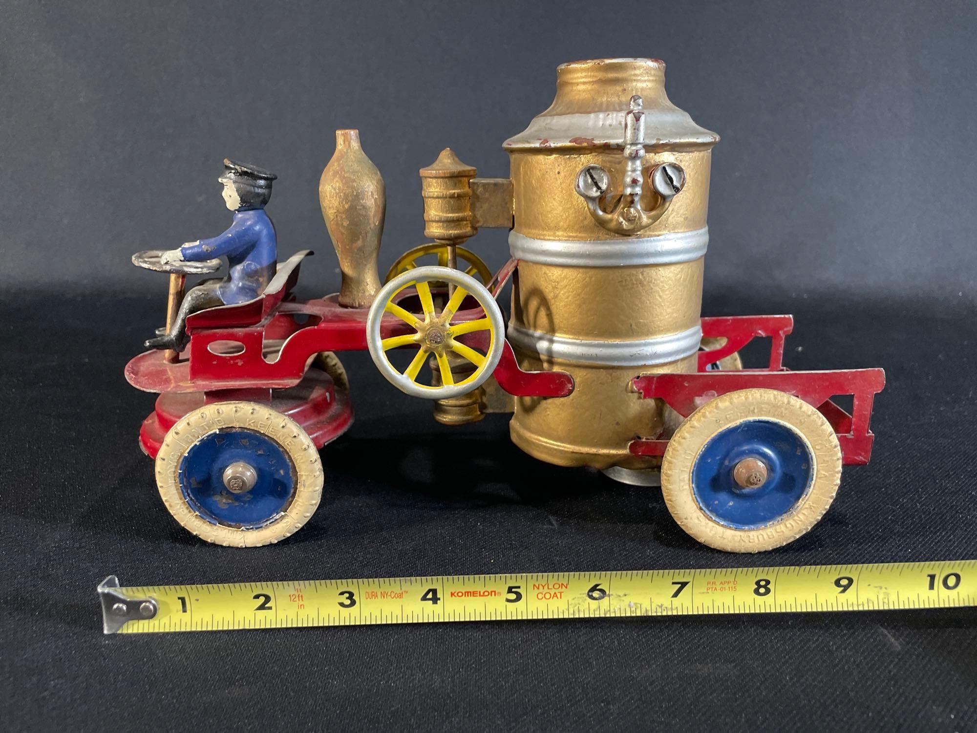 Antique Kingsbury tin windup pumper wagon w/ driver
