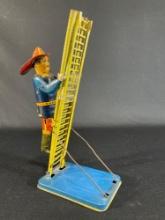 Marx Tin Litho Firefighter Climbing Ladder Wind Up Toy