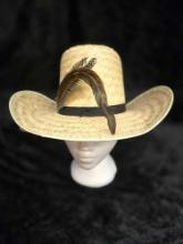 Straw hat with feather trim