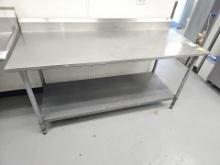 Stainless steel table with galvanized bottom shelf with Edlund can opener 72" x 30"