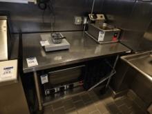 Stainless steel table top 4' x 30" with castors