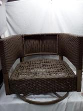 Outdoor Brown Swivel Chair.