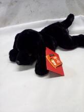 FAO Schwarz black dog plush “adopt a pet” 14in long