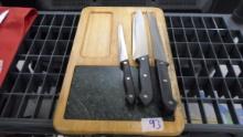cutting board and knives, 3 matching knives and a wooden and stone cutting board