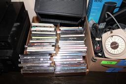 Lot of CD, Cassettes, Bose Speaker, Amazon Echo and More..