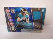 2021 PANINI DONRUSS OPTIC #RPH-1 TREVOR LAWRENCE GAME USED JERSEY RC COLORED PRIZM IN MAGNETIC CASE