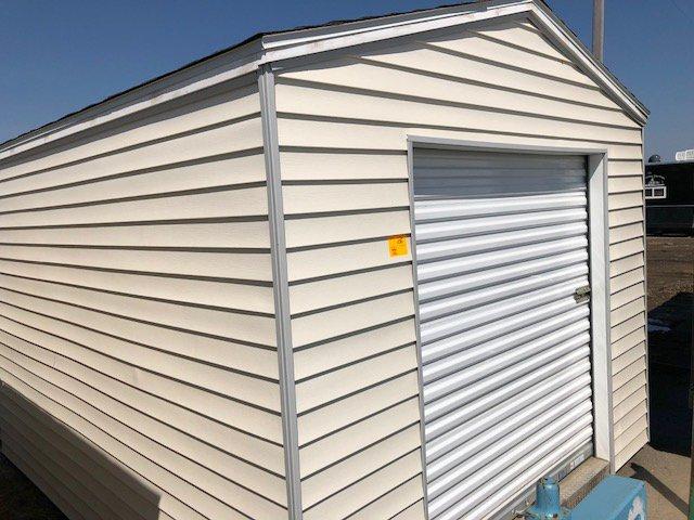 NEW 10' X 12' STORAGE BUILDING, LIGHT TAN IN COLOR