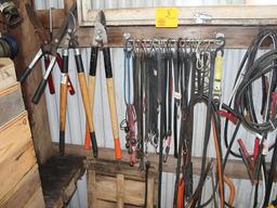 Contents of West Wall, Pole Saw, Bungees, Jumper Cables, Grease Guns, Wire