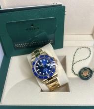 Brand New 40mm 18ct Yellow Gold Submariner 'Smurf' comes with box and papers