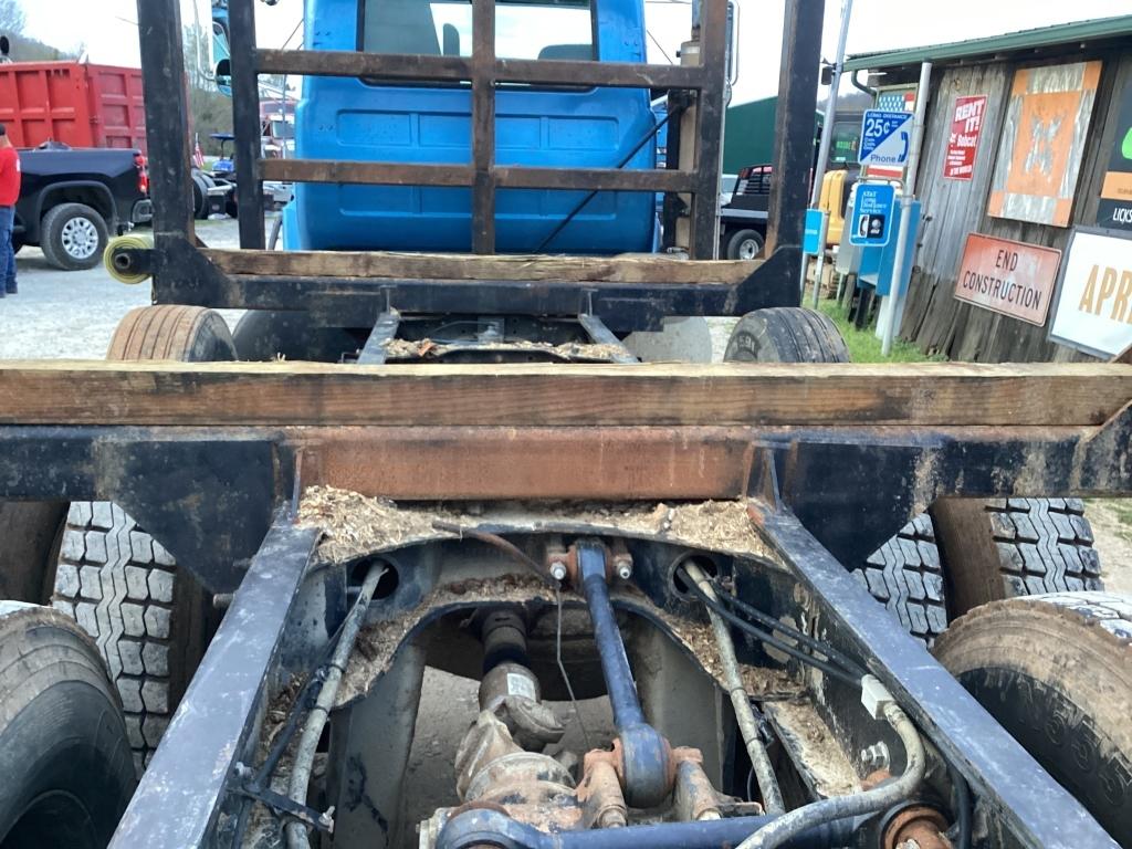 1999 MACK RD6885 DAYCAB TRACTOR WITH LOG BUNKS