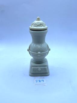 white statue avon bottle