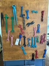 SET OF ANTIQUE WRENCHES ON WALL