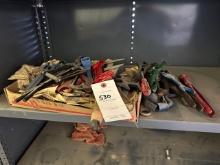 SET OF ANTIQUE WRENCHES ON SHELF