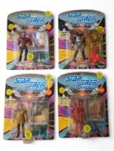 Four vintage Playmates Star Trek TNG action figures