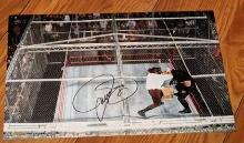 Autographed Mick Foley photo with coa sticker stamp