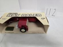 Ertl 1/16 scale IH Hay baller in box with simulated haybales stock number 454 box is in good conditi