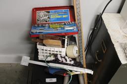 Heater (works), ruler, yard stick, flag and crate of tools/tape.