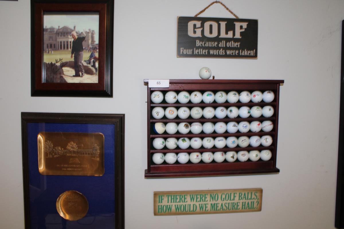 Golf Wall Lot. Includes ball rack and balls from various courses throughout the US. A commemorative