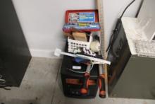 Heater (works), ruler, yard stick, flag and crate of tools/tape.