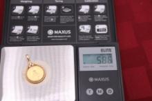 14k gold coin charm. 5.4 grams