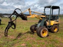 GEHL 140 ARTICULATING WHEEL LOADER WITH GRAPPLE ATTACHMENT