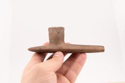 A 5-1/8" Pipe made of Carved Sandstone.