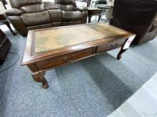 Traditional wood coffee table with map design, and 2 matching end tables