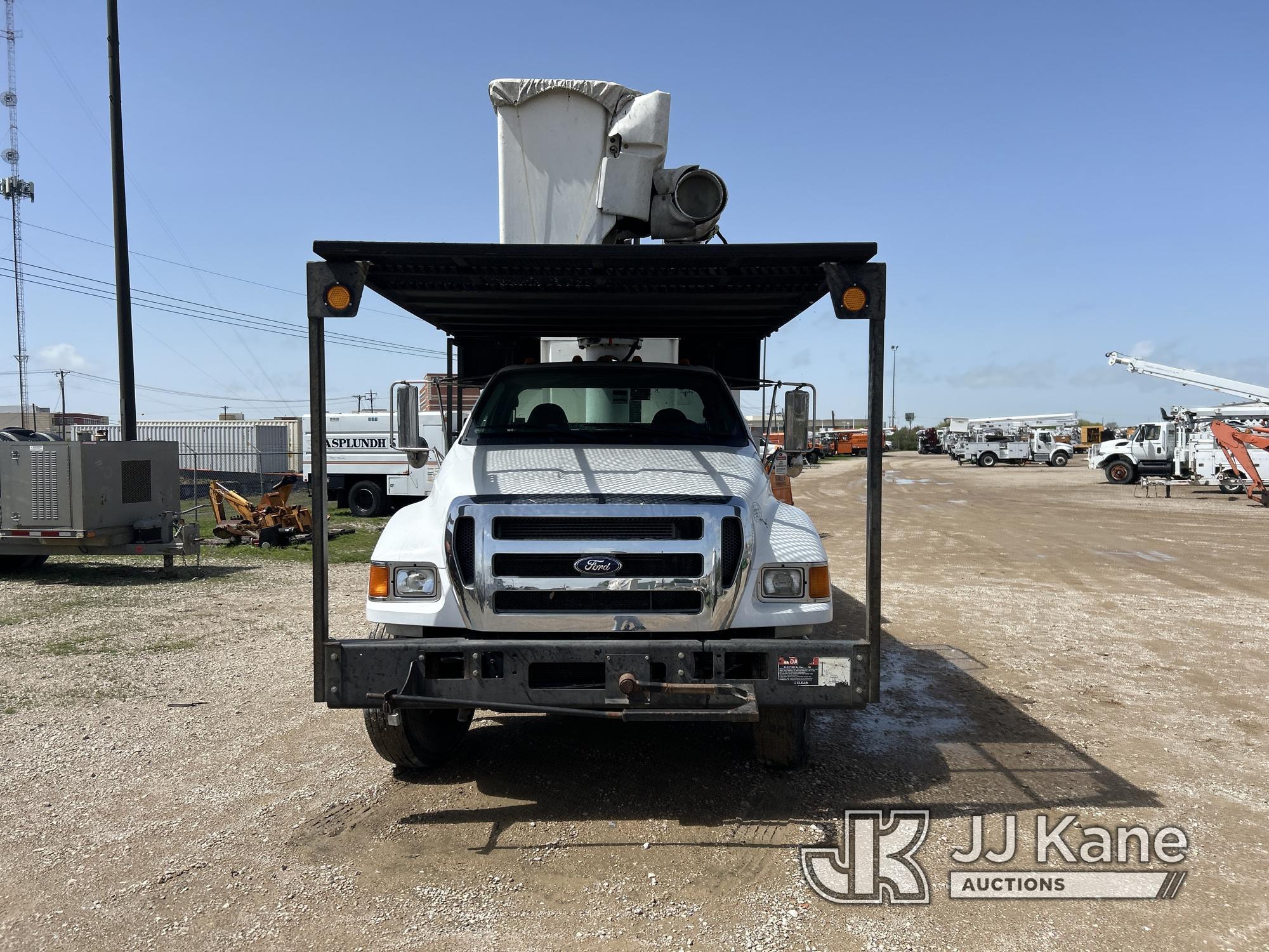(Waxahachie, TX) Altec LR756, Over-Center Bucket Truck mounted behind cab on 2013 Ford F750 Chipper