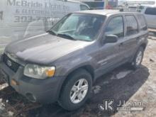 (Castle Rock, CO) 2005 Ford Escape Hybrid 4-Door Sport Utility Vehicle Runs,moves,operates.  Jump to