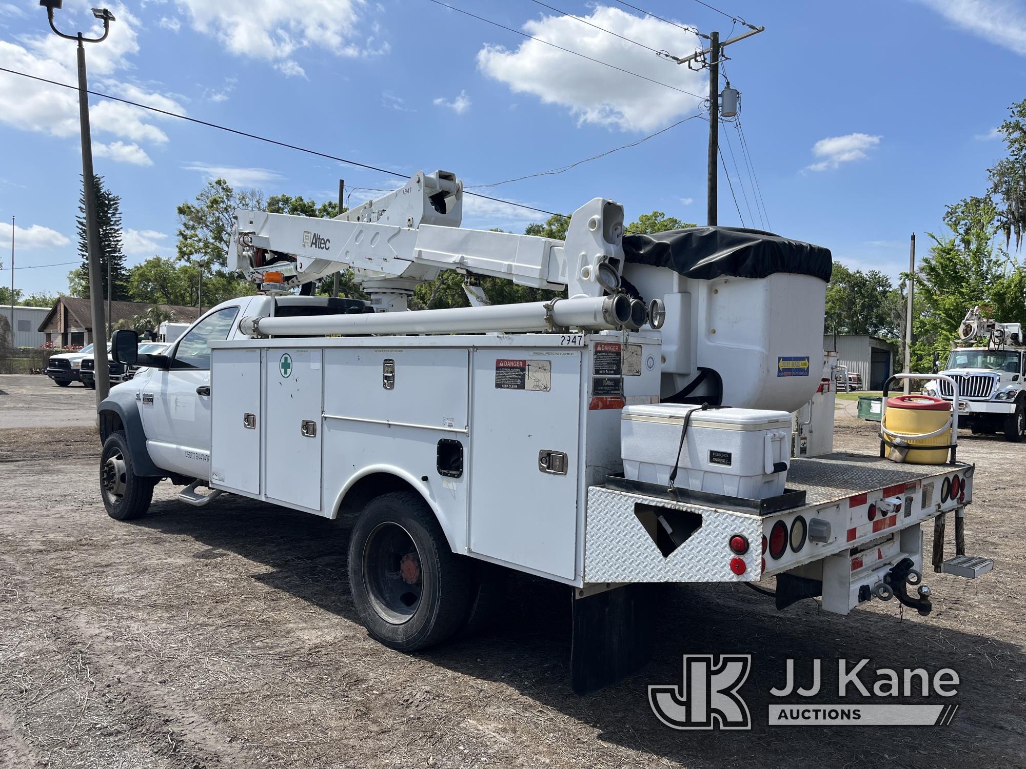 (Tampa, FL) Altec AT37G, Articulating & Telescopic Bucket Truck mounted behind cab on 2009 Dodge RAM